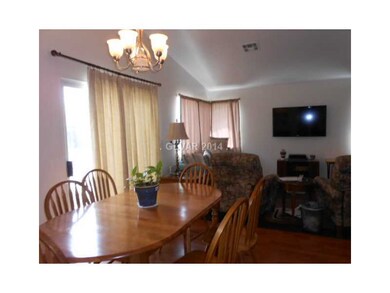 Property Photo. Roomy dining area open to living r