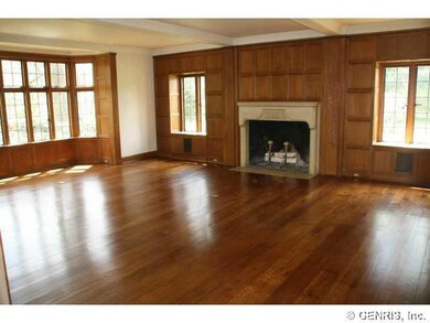 Living Room. Expansive bay window overlooking the 