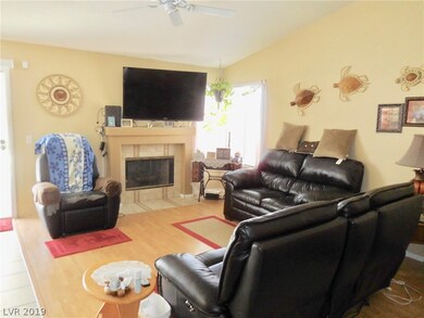 Great Room;  fireplace with mantel.  Door to backy