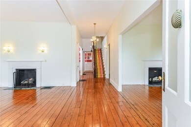 Original honey pine floors warmly welcome you.