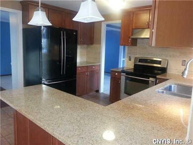 Kitchen. The kitchen was recently updated and boasts granite counters as well as new cabinets and appliances.