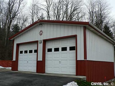 Parking Lot/Garage. Newer two garage/workshop.