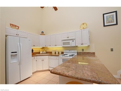 Granite island and under cabinet lighting.  This k
