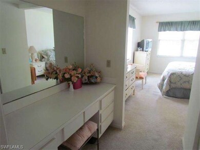 Makeup vanity located between the master bedroom a