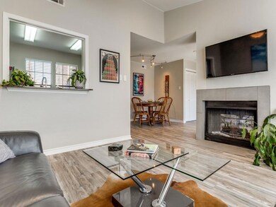 Living room featuring a fireplace and light hardwo