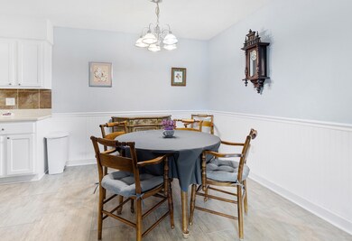 Dining area w/ wainscoting & chair rail