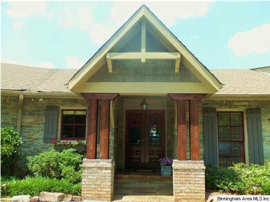 Beautiful front door entrance featuring stone, woo