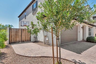 Garage with pave drive-way