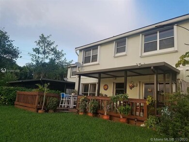 View of the back entrance and patio porch.