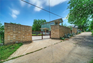 Larger gate to the east for car entry.