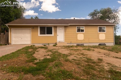 View of front of house featuring a garage, driveway, crawl space, and a shingled roof