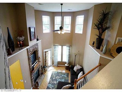 Keeping Room. Vaulted ceilings and stone fireplace.