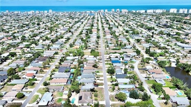Aerial view of residential area featuring a nearby