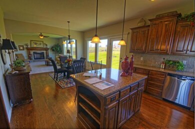 Gorgeous open floor plan boasts a wall of windows,