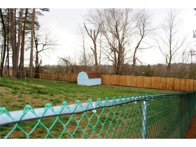 Seller has fenced-in the family-friendly backyard.