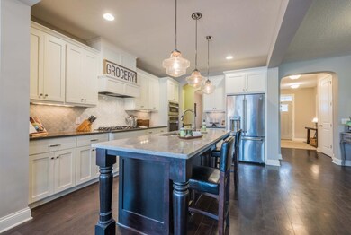 Entertaining in this kitchen will bring a smile to