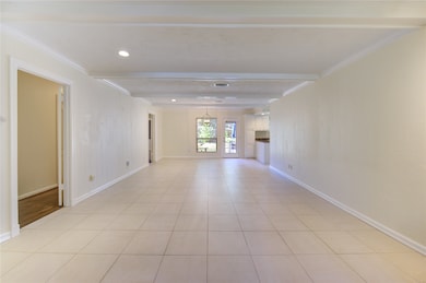 Family room looking towards the kitchen and backyard.