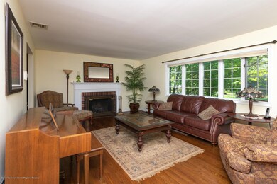 Living Room with Wood Burning Fireplace