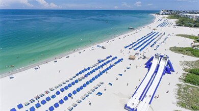 Beach front property with beach chairs on the Gulf