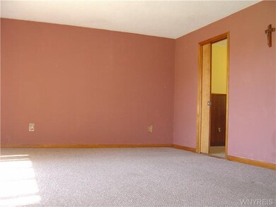Living Room. Bright living room with pocket door b