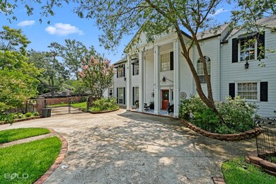 Circular driveway and extra parking on the side