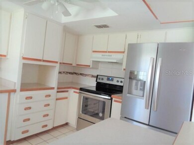 lots of cabinets, new stove, breakfast bar