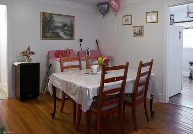 Spacious dining room with hardwood floors!