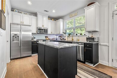 Granite counter tops, freshly painted lower cabine