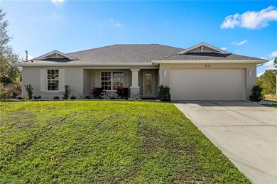 Single story home featuring an attached garage, dr