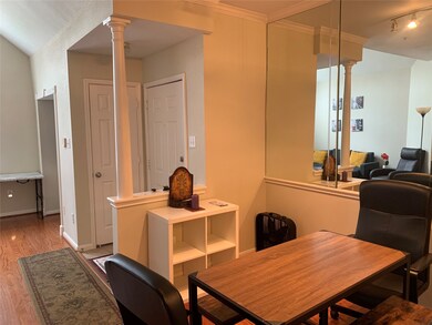 Spacious dining area that has a glass wall.
