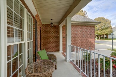 Delight in the day from your covered front porch,
