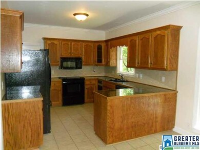 Kitchen with loads of storage and is just off the 