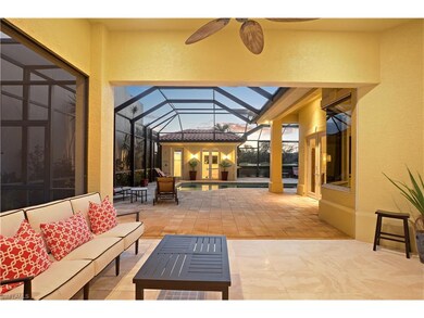 Covered Lanai opens up to the screened in pool dec
