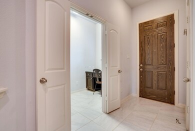 Hallway featuring baseboards