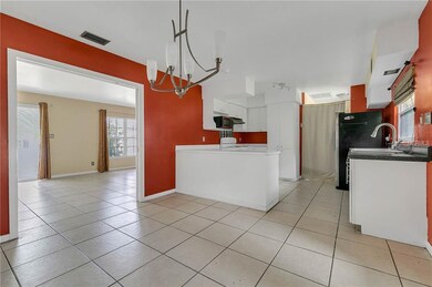 Located off of the Living Room and Kitchen is the 