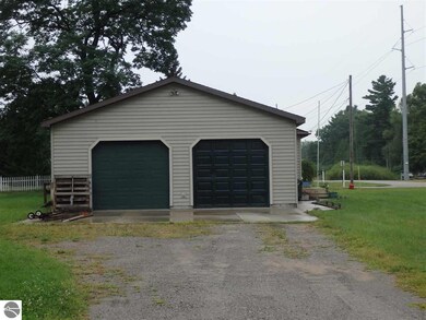2 car, attached garage w/work space.