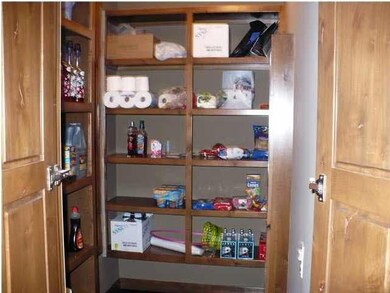 WALK IN PANTRY WITH LOTS OF SHELVING, WINDOW FOR A