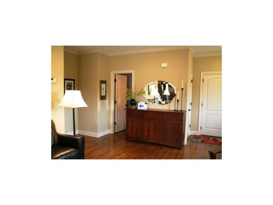 Spacious entry way with half bath.
