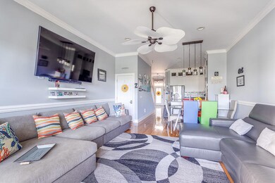 living room opens to dining area