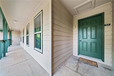 Doorway to property with a porch