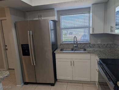 Kitchen featuring appliances with stainless steel