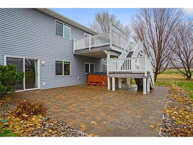 Paver patio with hot tub and deck