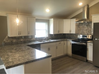Kitchen with vaulted ceiling