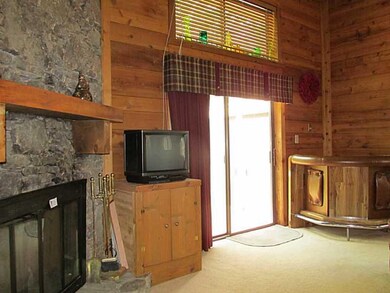 Living Room. Glass slider leads out to back deck w