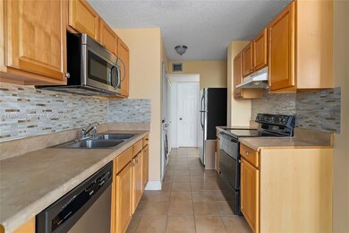 3550 Blue Lake Dr unit 502, Pompano Beach, FL 33064 - photo 2