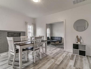 Dining area featuring light hardwood / wood-style 