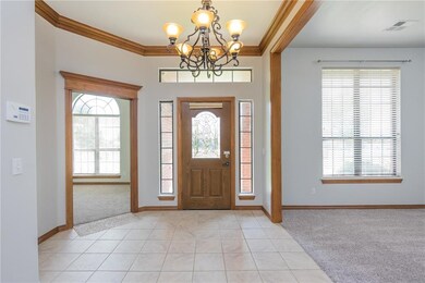 Entry w/ Study to left and Formal Dining to right