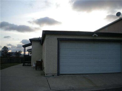 Twin homes, one with attached garage