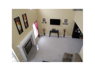 View of great room shows gas fireplace and dramati