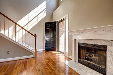 Cozy fireplace with gas logs and elegant marble su
